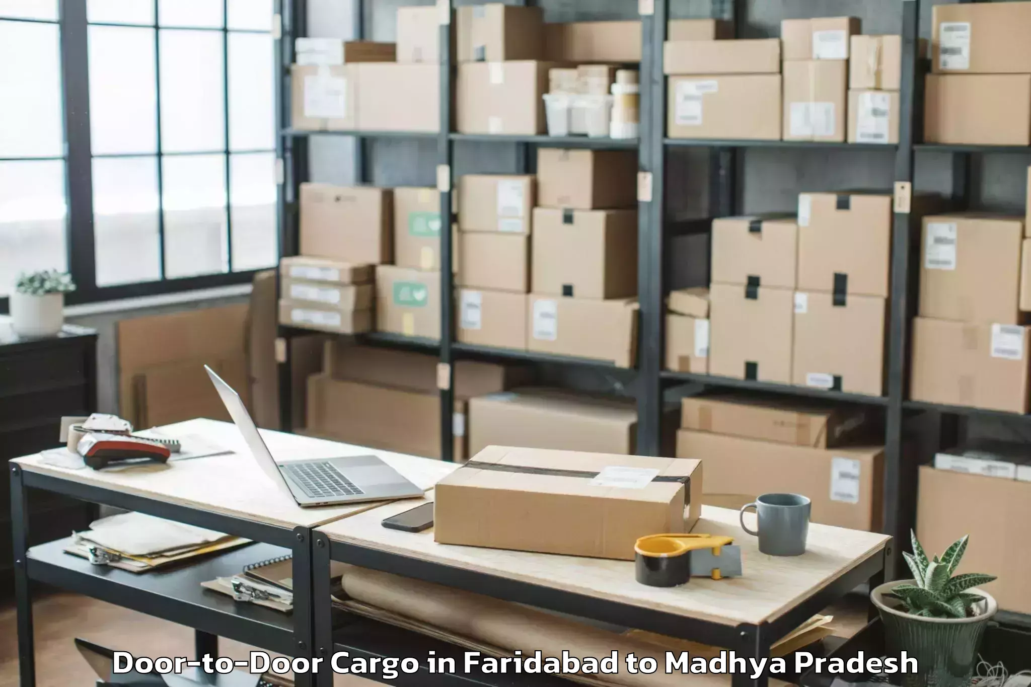 Easy Faridabad to Jiwaji University Gwalior Door To Door Cargo Booking